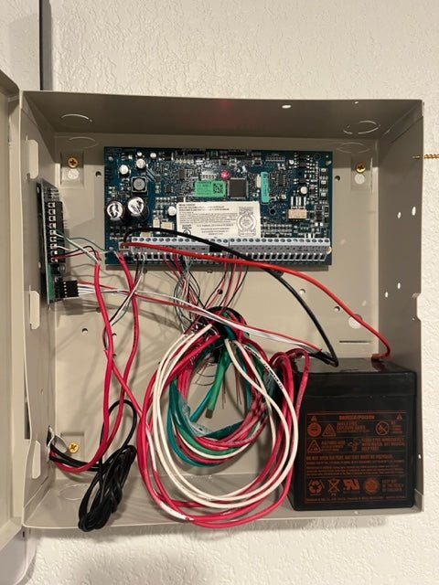 Wireless home security system with PowerG sensors, smart keypad, and mobile monitoring—installed without prewiring in a modern Texas home.