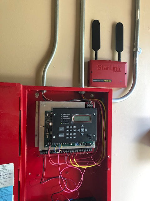 Commercial fire alarm system with pull station, smoke detectors, and 24/7 monitoring in Austin Texas